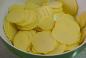 Sliced potatoes in a bowl