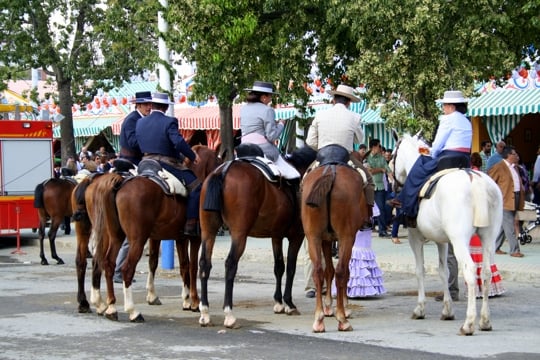 Chatting on horseback Feria Sevilla