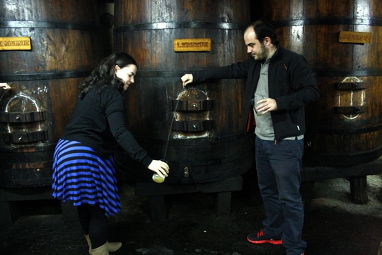 Pouring cider at the cider house