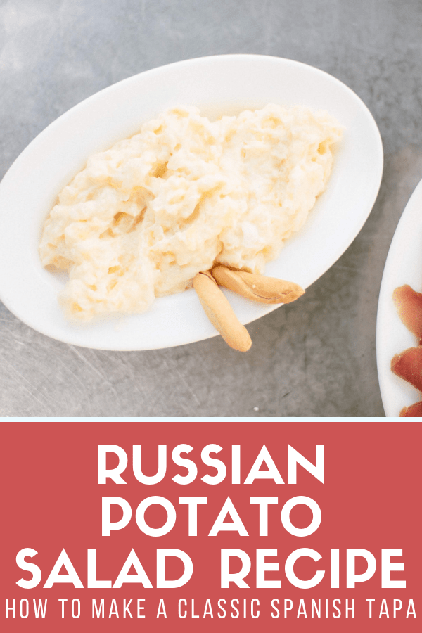 Despite its name, Russian potato salad is actually one of the most popular typical tapas in Spain! It's quite easy to make, too. It's packed with veggies and seafood, and makes the perfect appetizer or addition to a tapas dinner. This is one of those dishes that you'll make again and again! #foodie #tapas