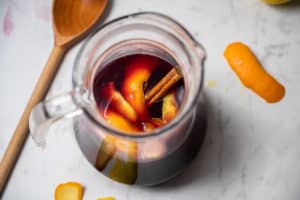 Pitcher of traditional Spanish sangria with cinnamon stick