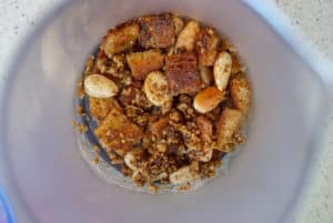 Fried garlic, almonds and bread cubes in an immersion blender