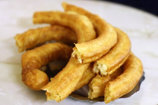 These are churros, a very typical breakfast in Malaga. It's fried dough that we dip in steamy hot chocolate - yum!