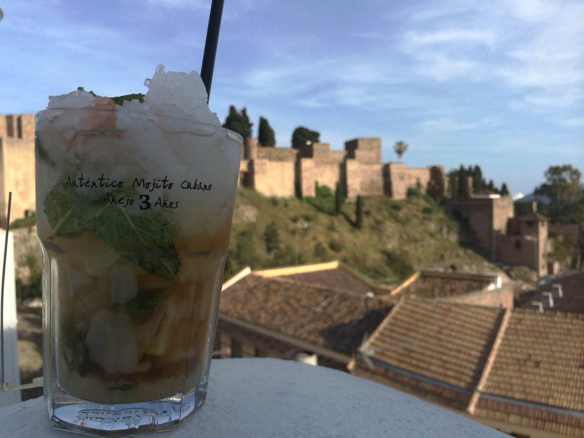 Enjoying a Mojito on the rooftop terrace in Malaga in May