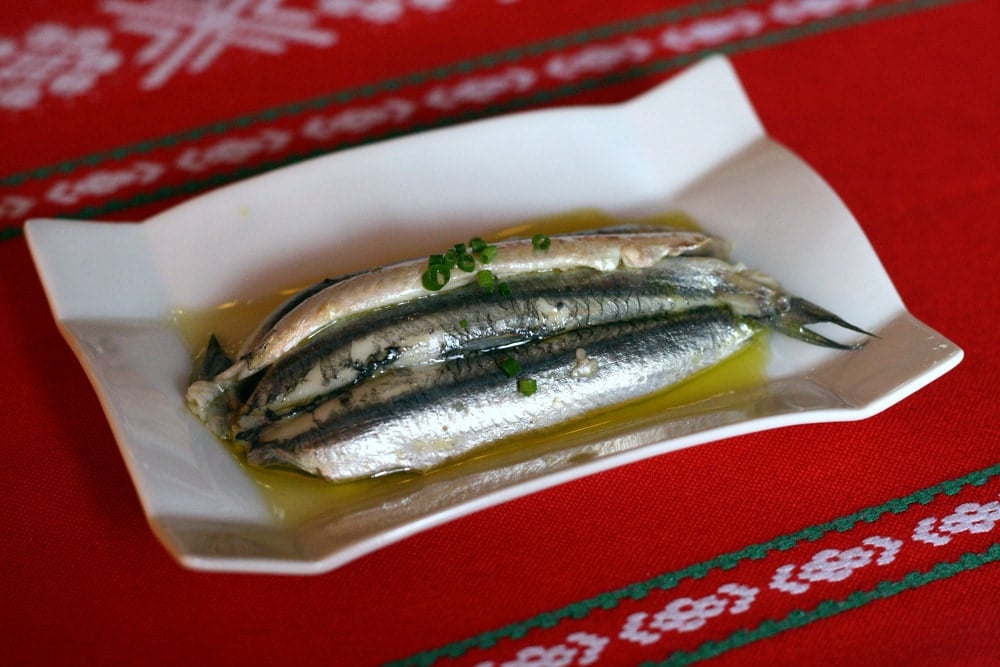 Delicious Cantabrian anchovies, aka "boquerones en vinagre" are one of the best things to eat in Spain in summer!