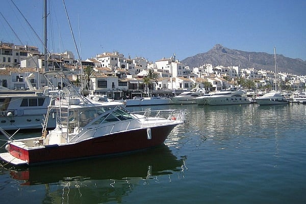 Visit the fancy harbor of Marbelle not far from Malaga in August!