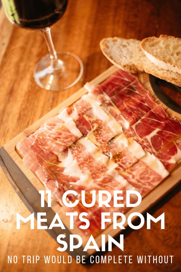 A platter of Spanish cured meats is as typical and authentic as it gets. From the ever-popular jamón to lesser-known gems like chistorra and botifarra, here are 11 tasty varieties to start your next tapas party off right. #Spain #delish
