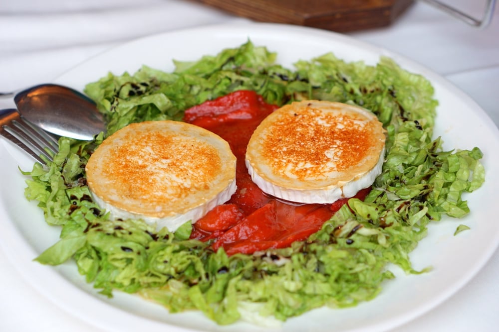 A simple but amazing salad of roasted red peppers and goat cheese.