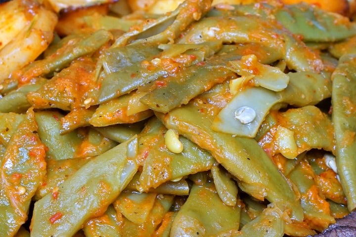 Delicious Spanish green beans with tomato., one of the best fall foods in Spain!