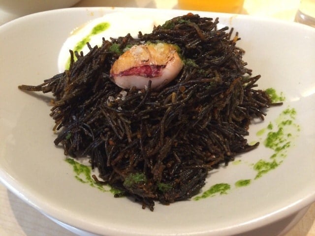 Not sure where to eat in Malaga's Historic Center for lunch? Try Taberna Uvedoble and this delicious dish of black noodles with baby squid.