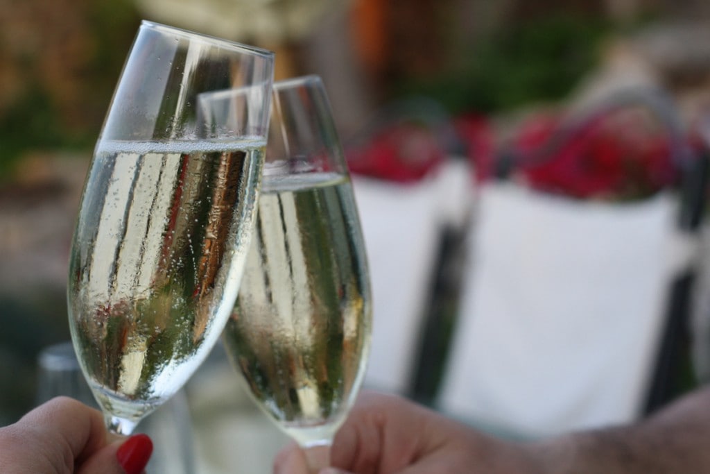 New Years in Spain is full of traditions. One is to drop something gold into a glass of cava!