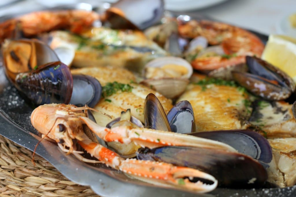 Figuring out just what type of seafood to order or what all those creatures at the market actually are can be quite tricky! This insider's guide to seafood in Spain demystifies it!