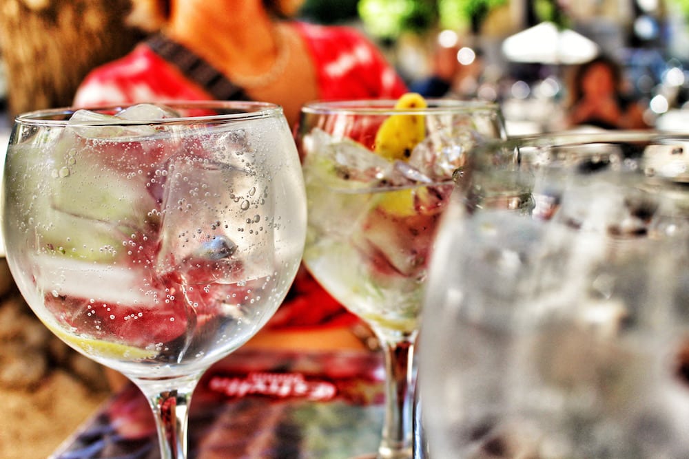 Close-up of large gin and tonics on an outdoor café table