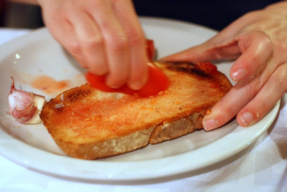 Tomato bread in Barcelona-- one of the most typical Barcelona tapas!