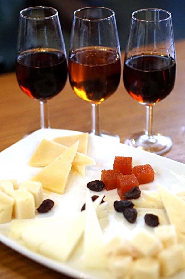 Sweet wine and cheese at El Pimpi, one of the most famous traditional tapas bars in Malaga