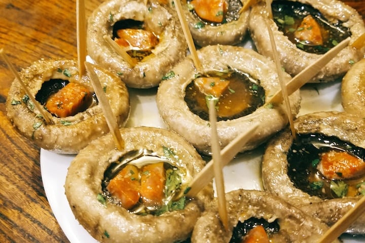 Grilled mushrooms at one of the best tapas bars in Madrid.