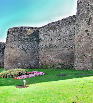 Lugo's Roman walls encircle the historic city center. Be sure to take a walk on the path on top of the walls to get a great view of this charming foodie paradise! Lugo is one of our favorite day trips from Santiago.
