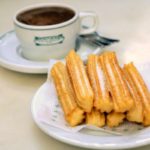 Churros sprinkled with sugar and rich hot chocolate, a traditional Spanish combination. Don't leave Galicia without trying the best churros and chocolate in Santiago de Compostela!
