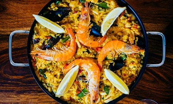 Las Perdices is one of the best places to eat paella in Granada. Great options are arroz caldoso, paella mixta, or the seafood paella seen here. 