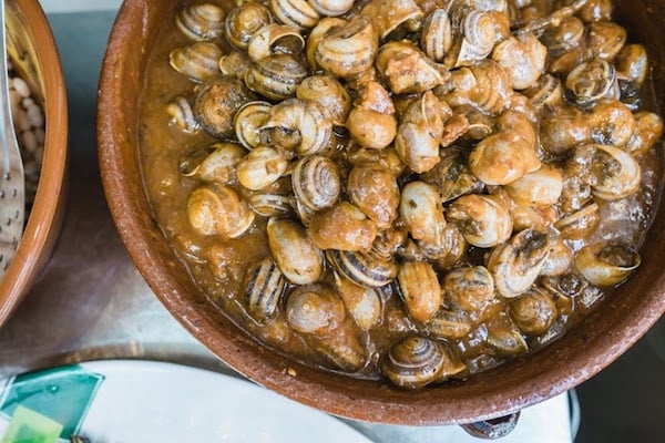 Try caracoles (snails) at Los Mascarones in Granada, one of the best places to eat in the Albayzín.