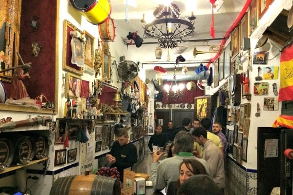 Eat like a local in Granada at a traditional tapas bar.