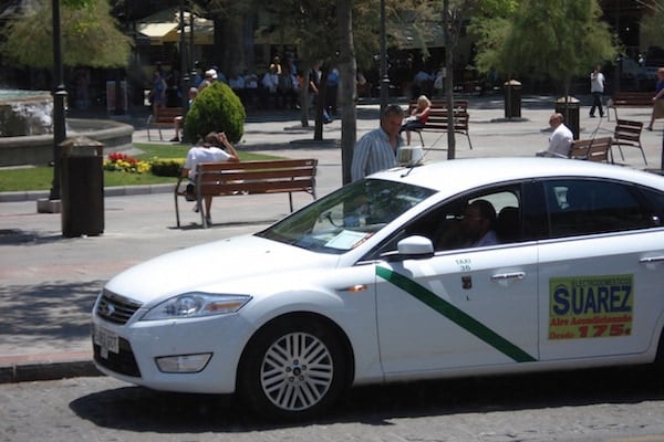 Taxis are a common form of public transportation in Granada.