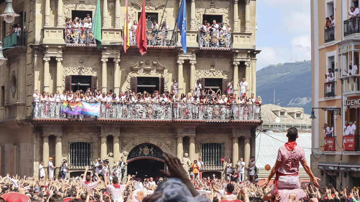 Crowds wait for the start of the San Fermín festival outside the town hall in Pamplona.