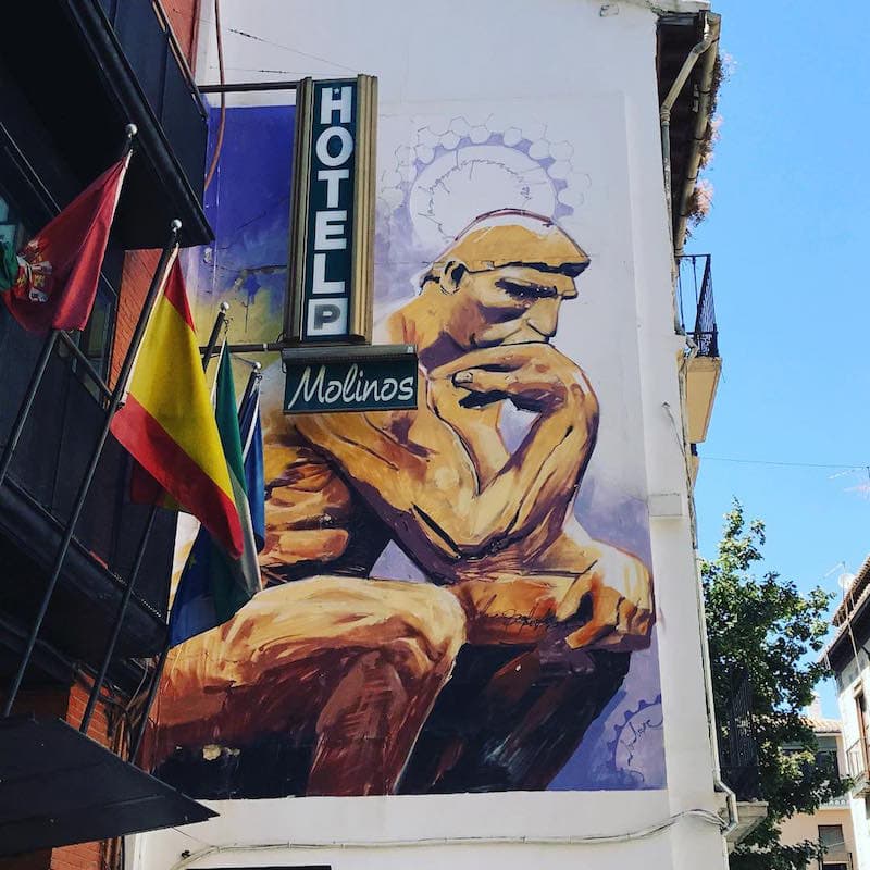 The street art in Granada is breathtaking, especially this incredible depiction of The Thinker on the side of Hotel Molinos!