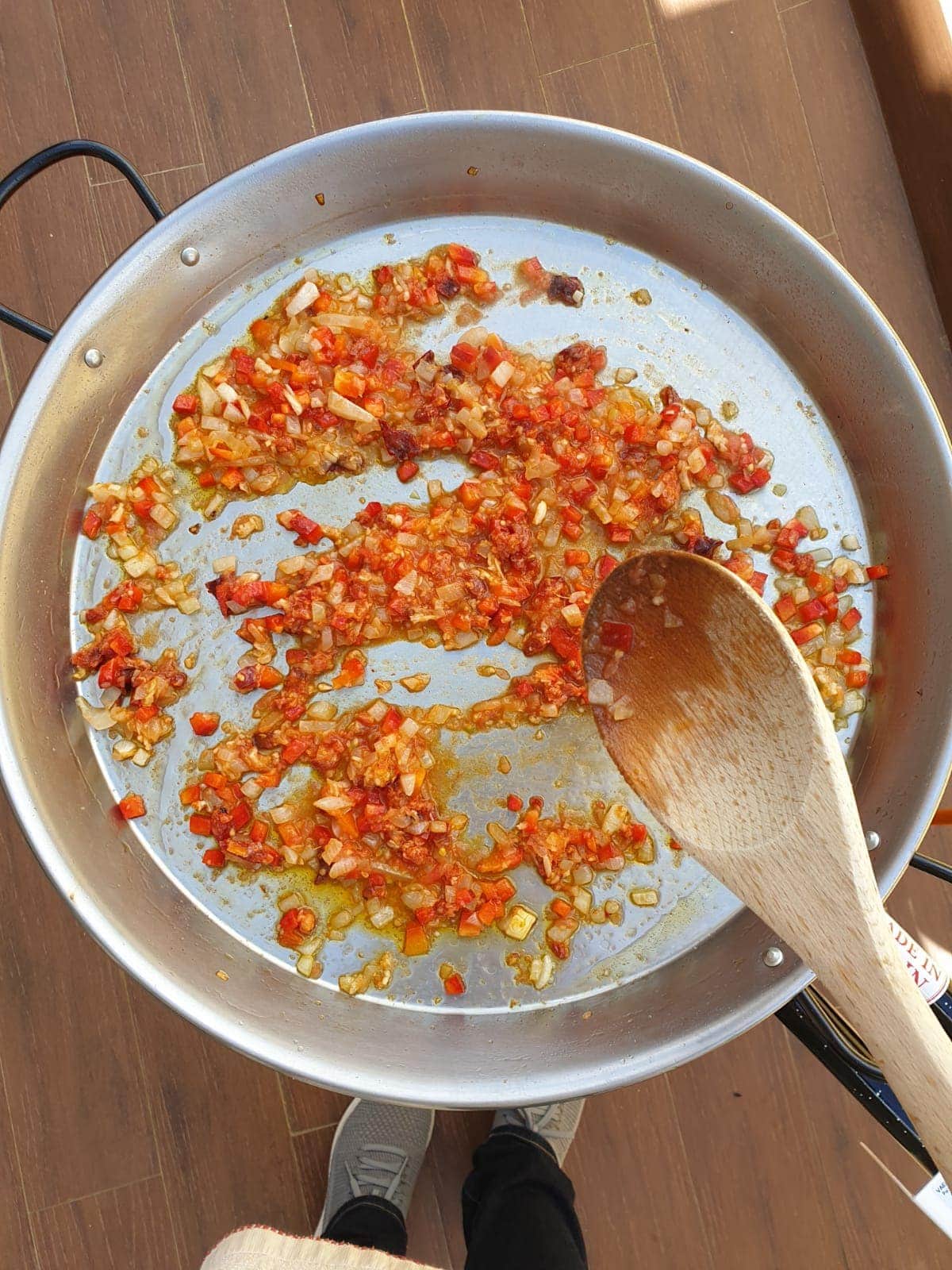 Making the sofrito for paella.