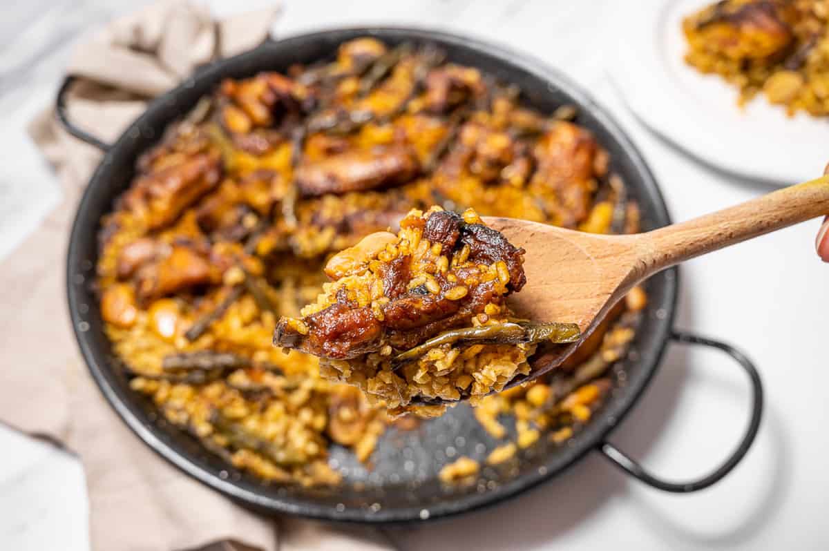 Close up of a spoonful of Valencian paella