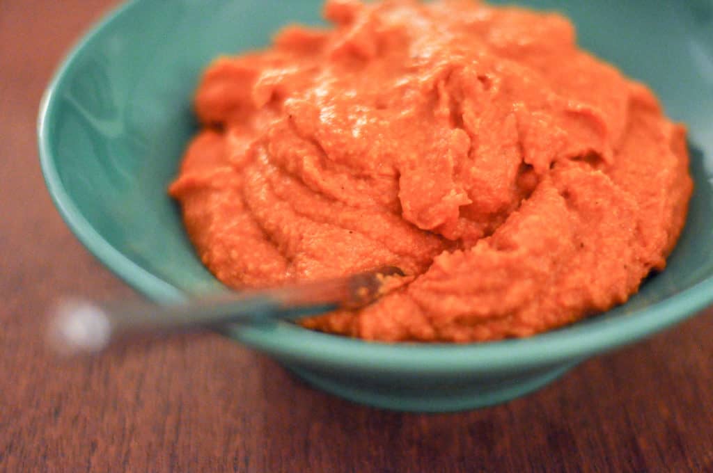 Romesco sauce in a blue bowl