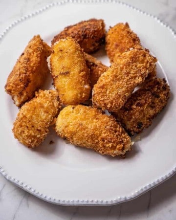 Fried croquettes on a white plate