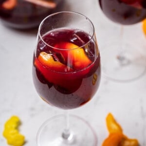 stemmed wineglass of traditional sangria.