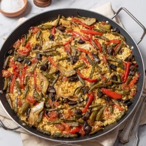 large shallow pan of vegetable paella.