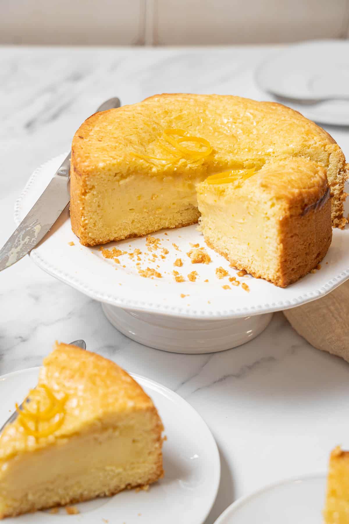 serving gateau basque in large slices.