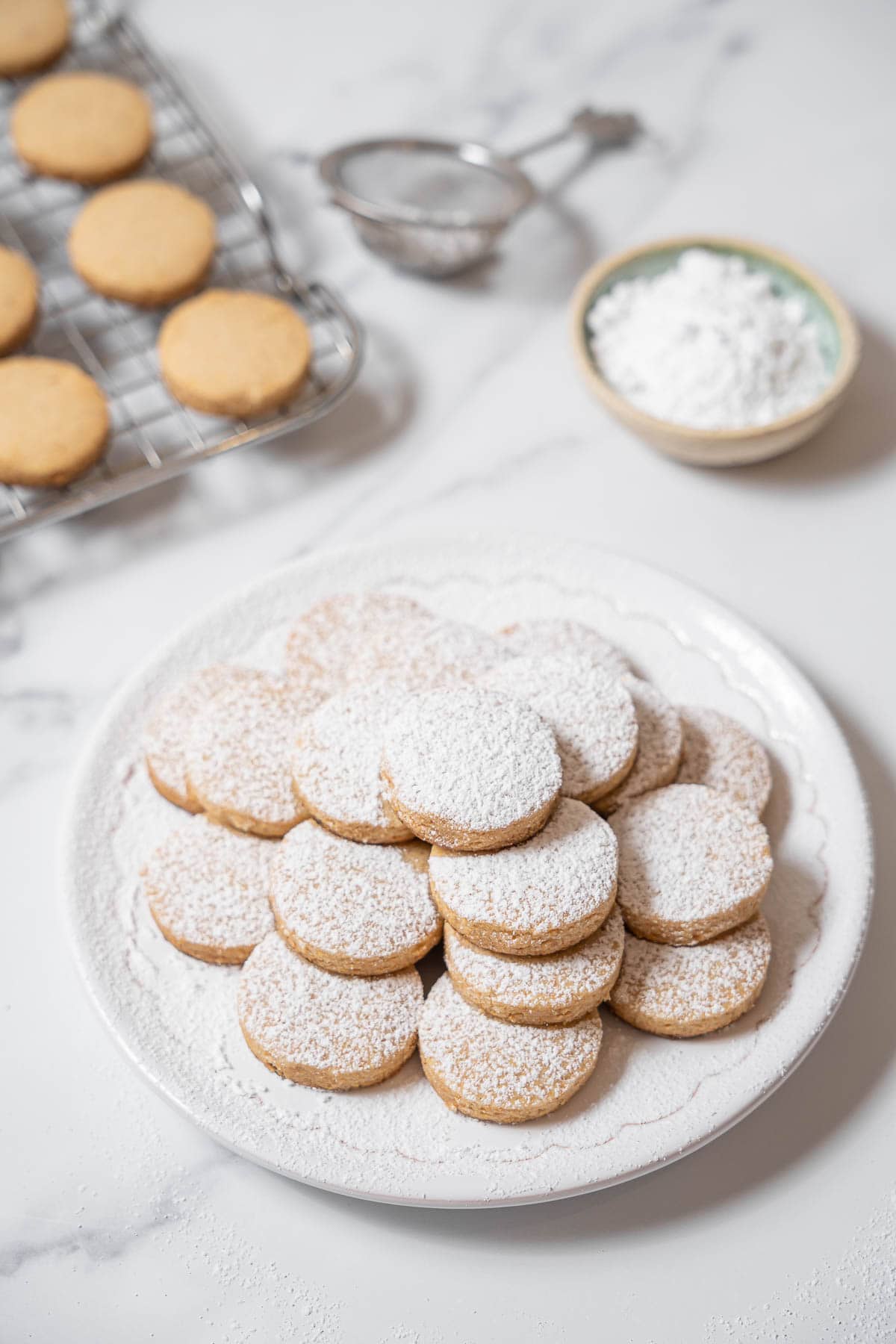 plate of polvorones on a white plate.