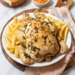 whole roasted chicken with french fried potatoes.