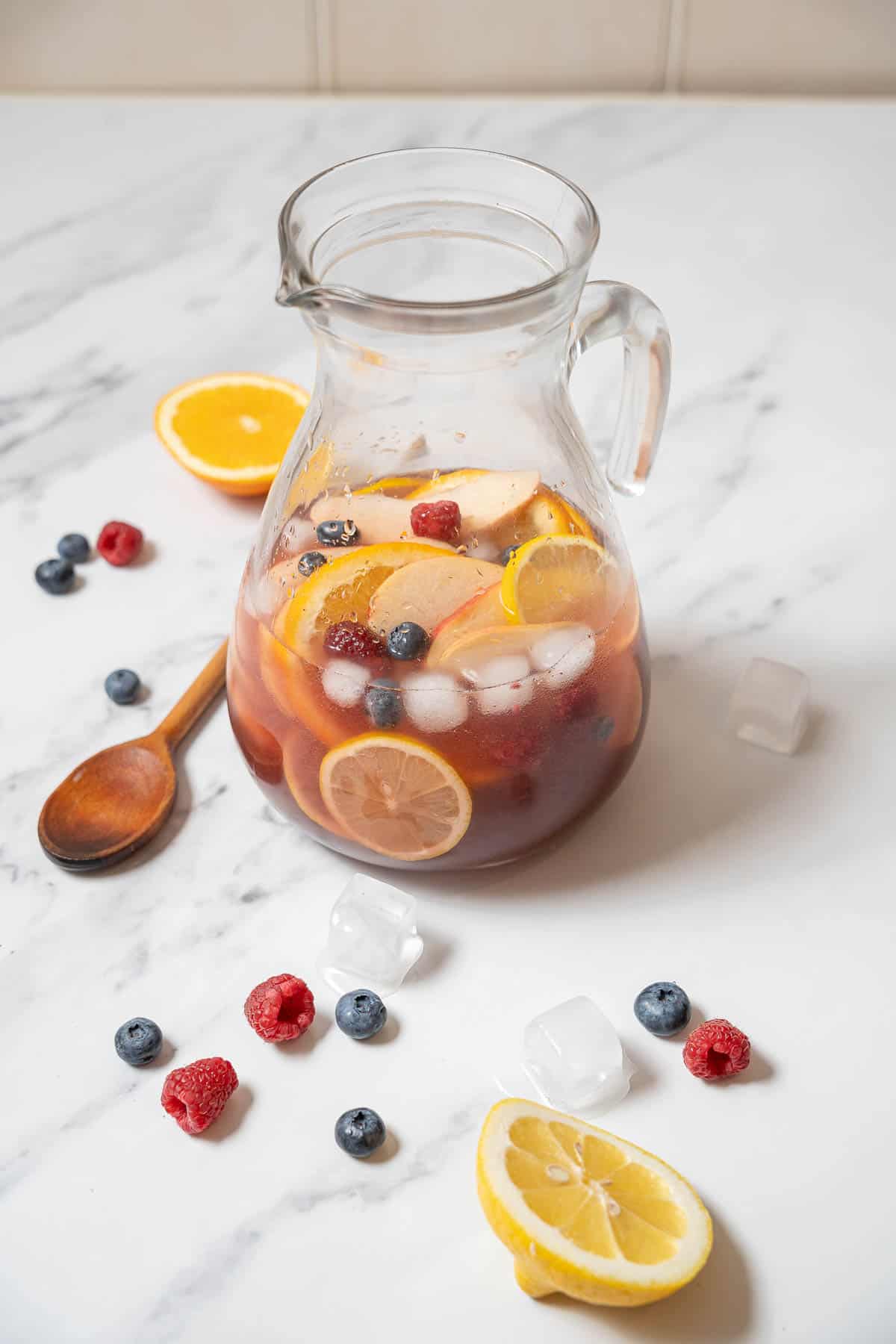 glass pitcher of non-alcoholic sangria.