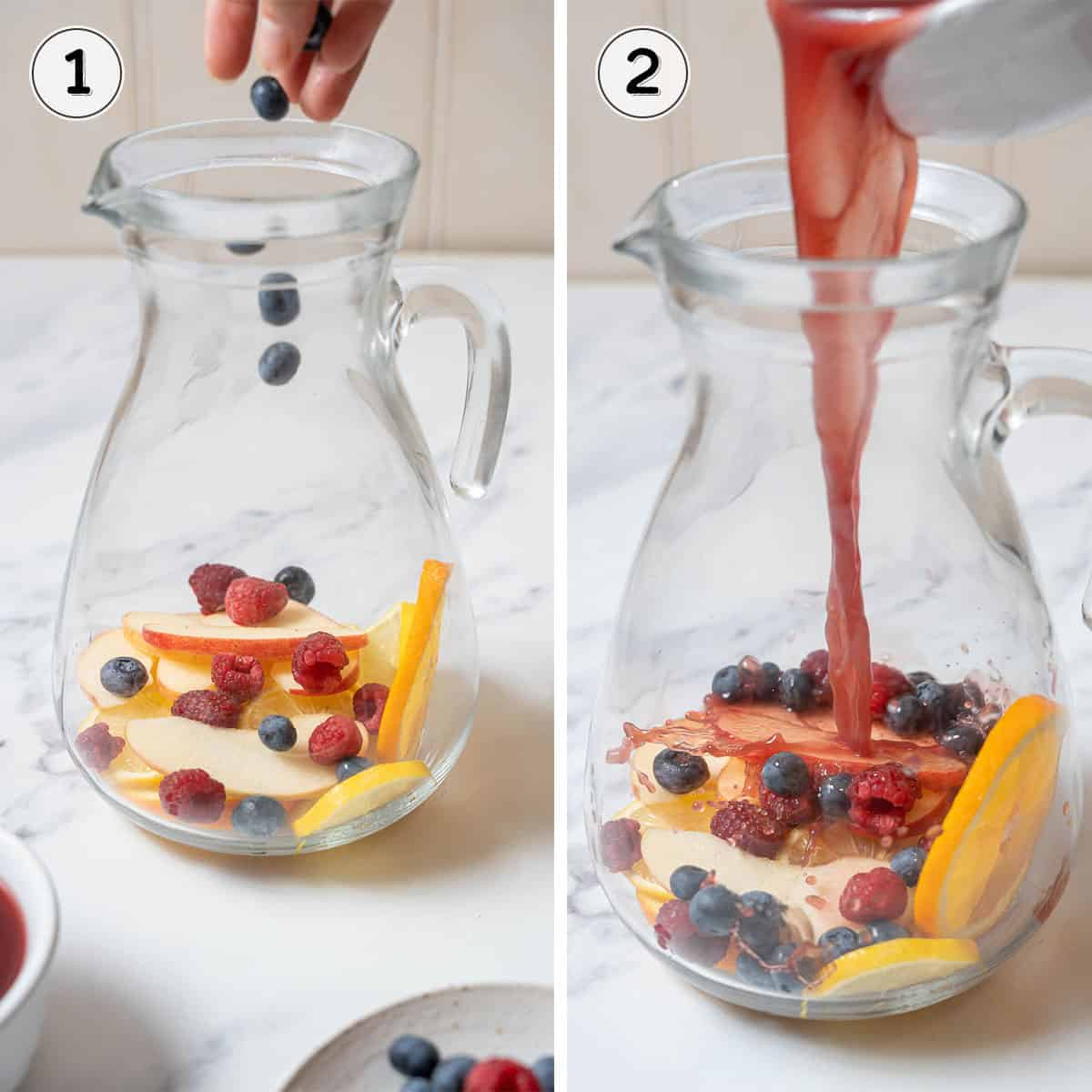adding fruit and juice to a glass pitcher.
