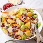 bowl of winter salad with pomegranate.