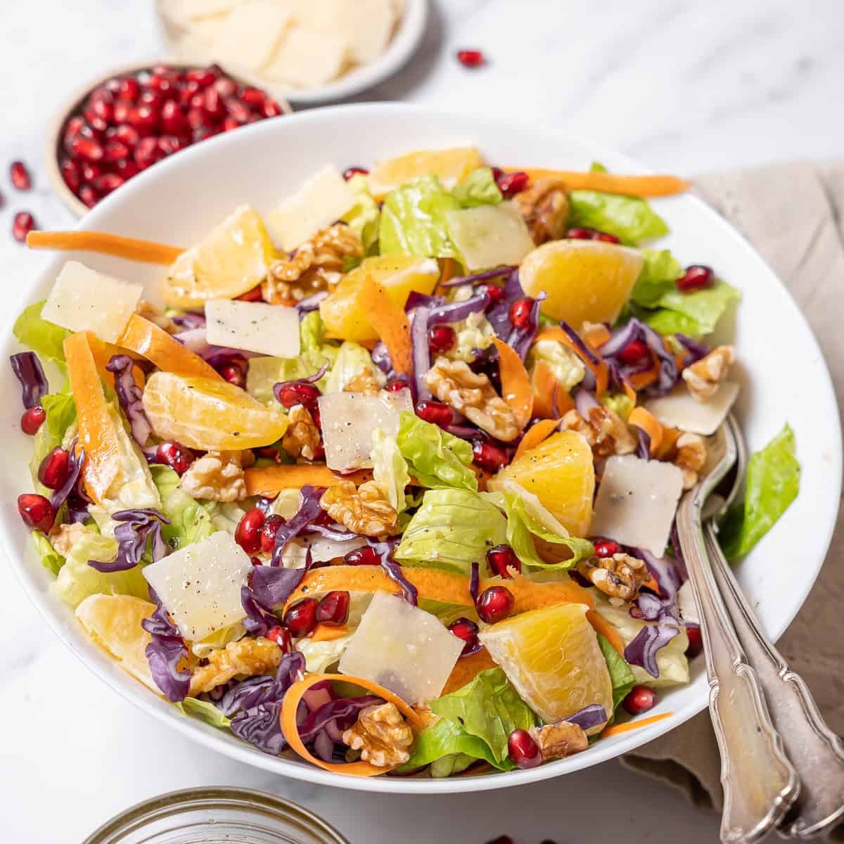 bowl of winter salad with pomegranate.