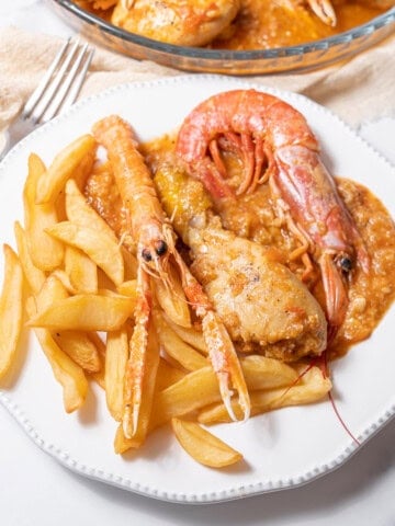 plate of mar y muntanya with french fries.