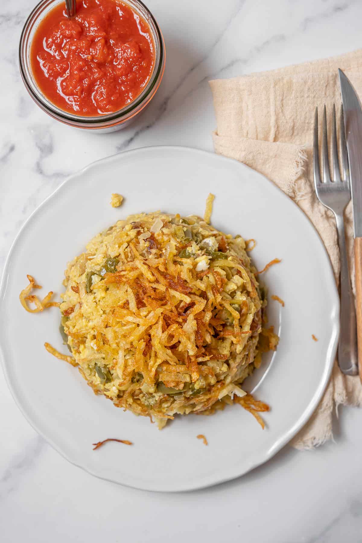 serving fried salt cod with tomate frito.