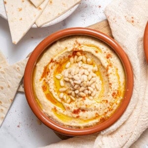 bowl of Spanish hummus with tortillas.