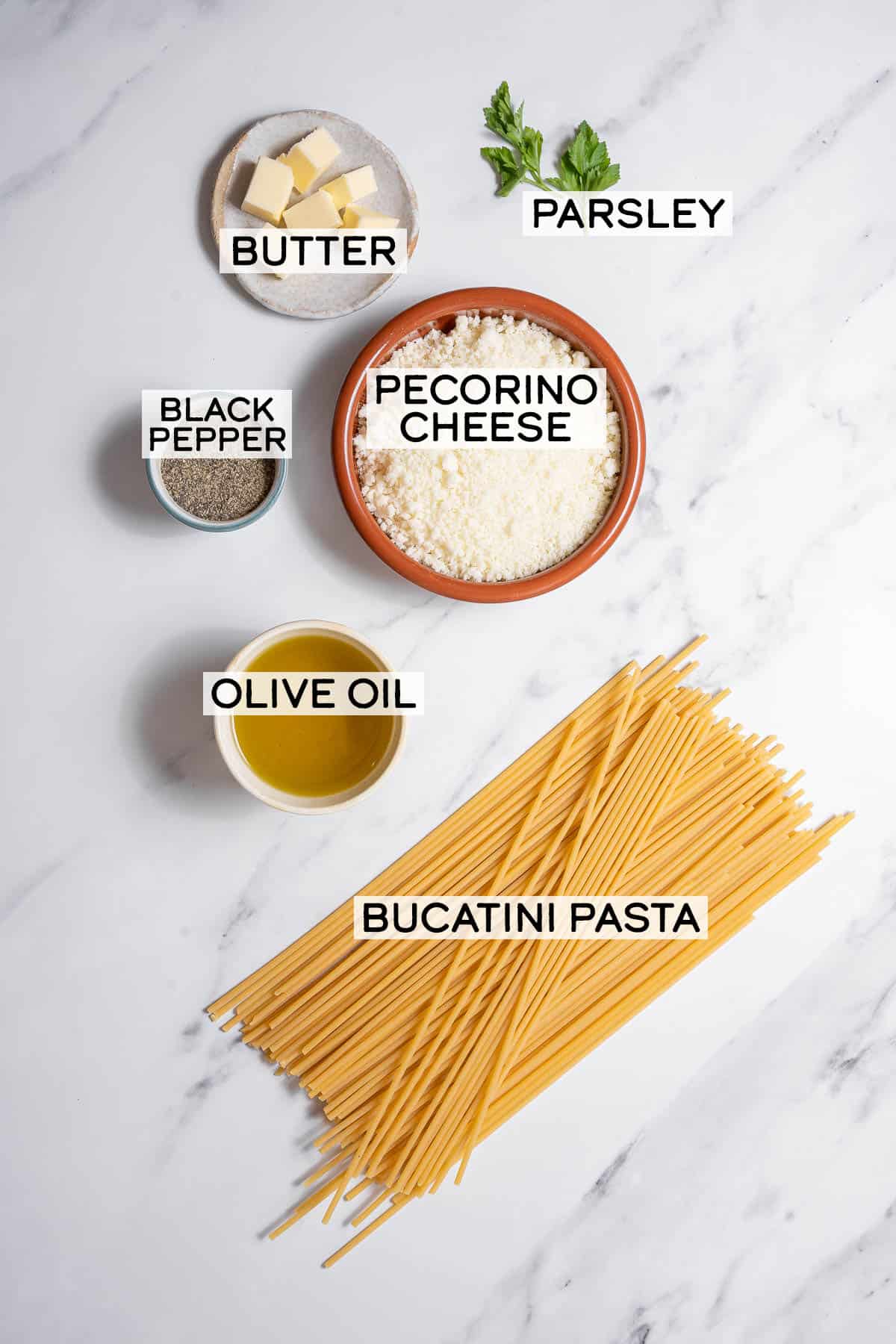 bowls of ingredients for cacio e pepe.