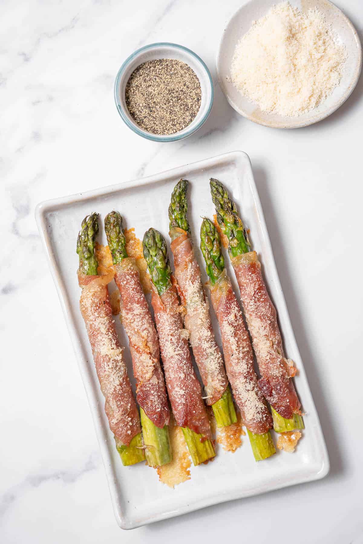 roasted asparagus with pepper and cheese.