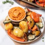 plate of roasted vegetables with dip.