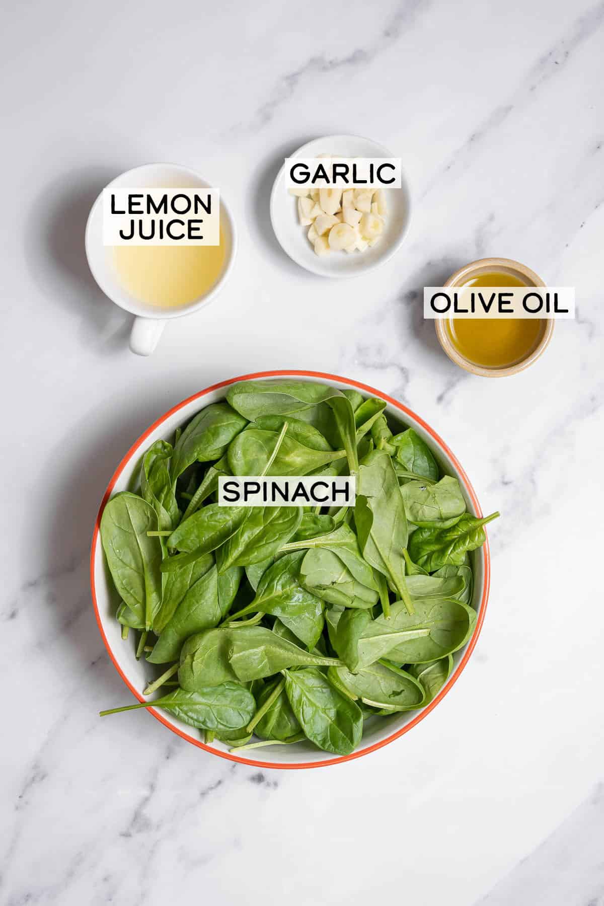 ingredients for spinach with garlic and lemon.