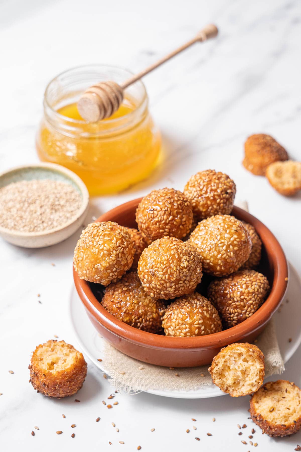 bowl of cheese puffs with honey.