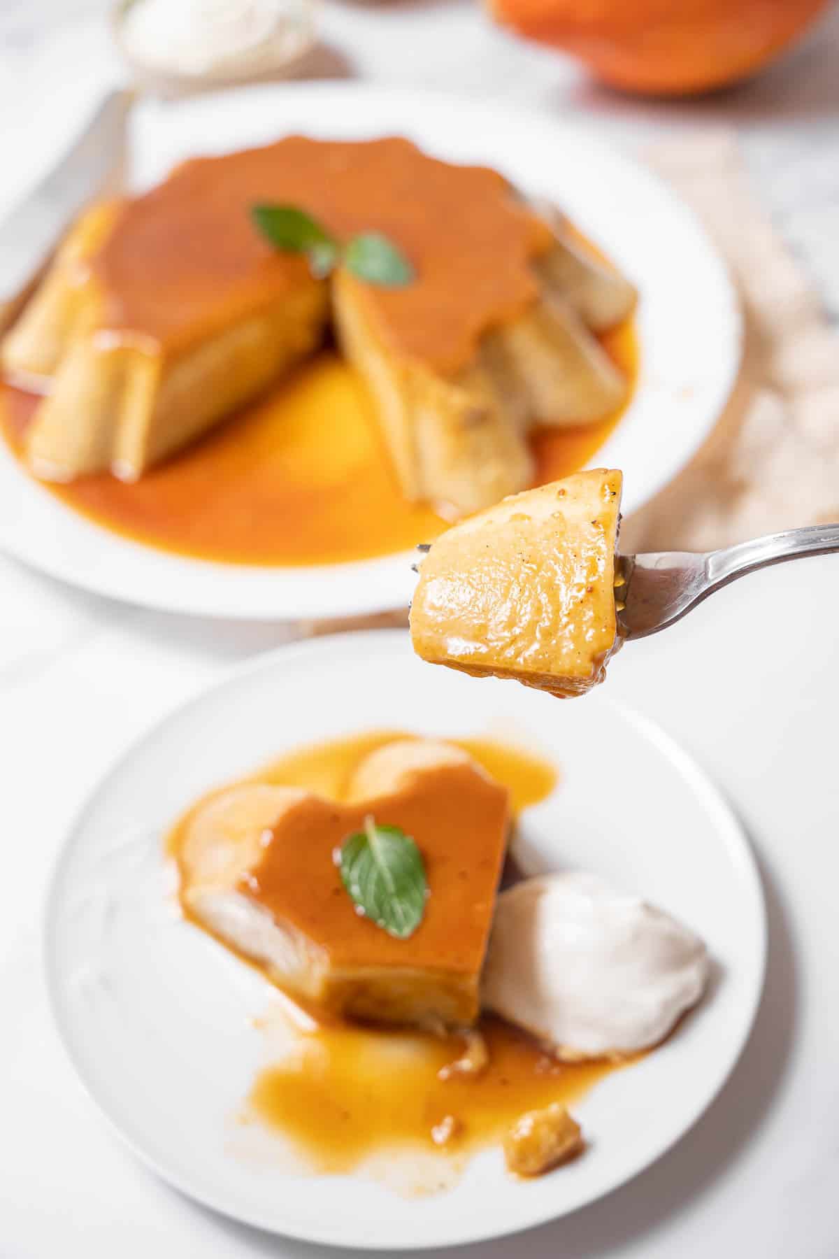 holding a forkful of pumpkin flan.